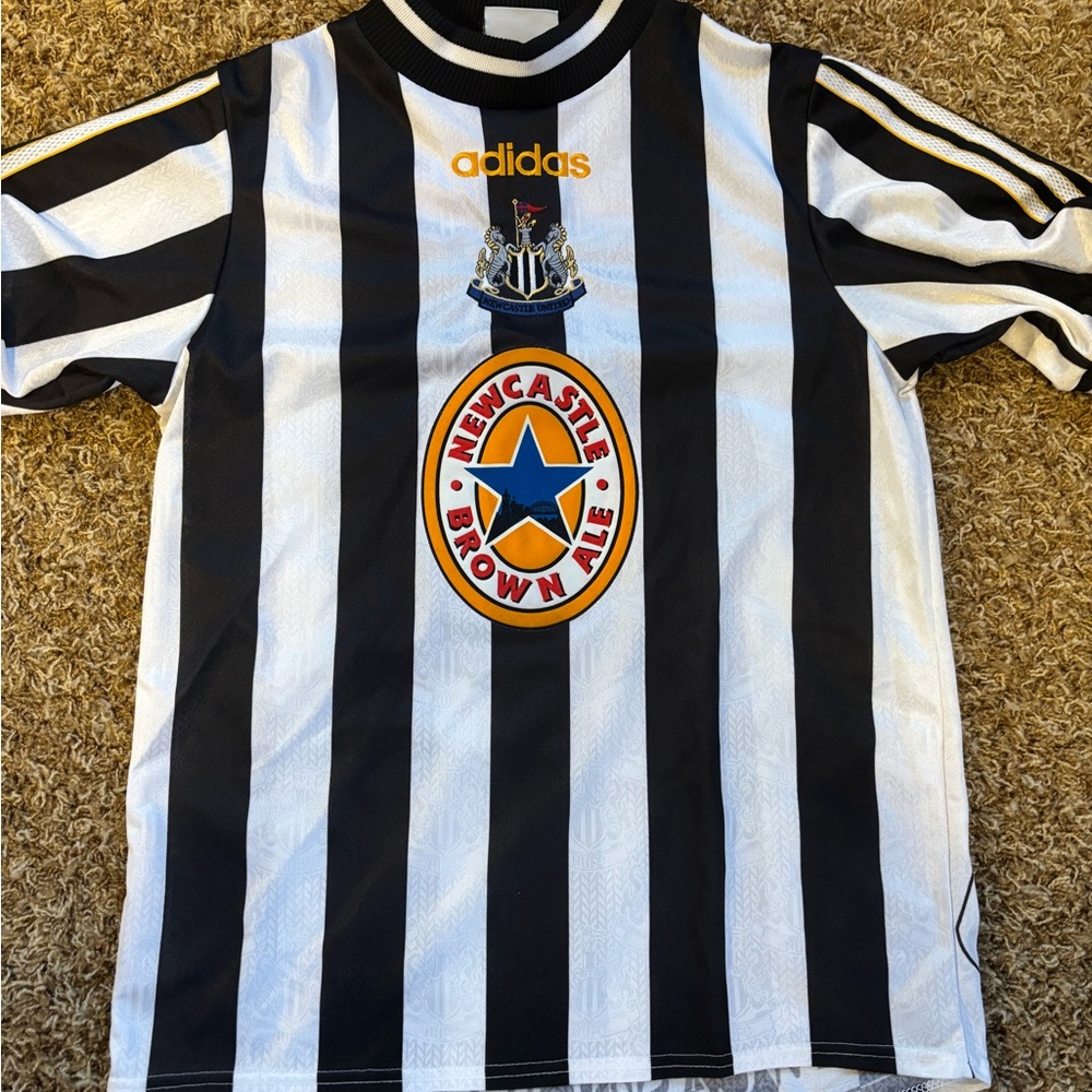 Adidas Newcastle United Black and White Striped jersey from the late 1990’s